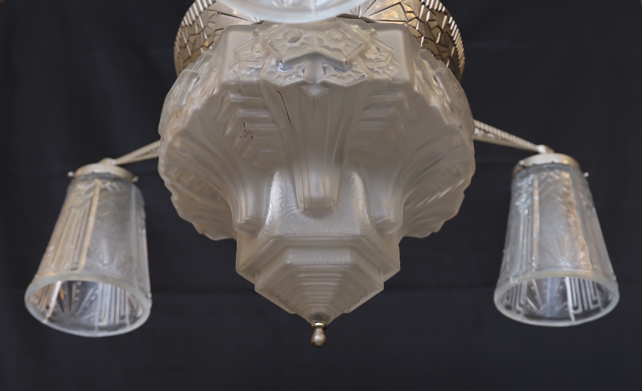 A French Art Deco silvered metal and frosted glass light fitting signed Muller, height 60cm. width 58cm